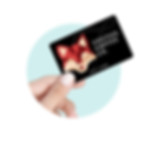 A hand holding a Foxtail Coffee physical gift card.